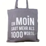 Baumwollbeutel mit Spruch 'Ein MOIN sagt mehr als 1000 Worte'.