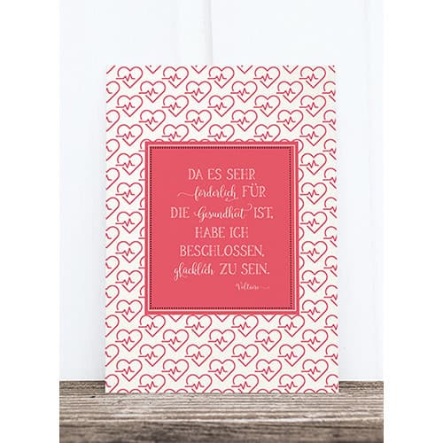 Ein inspirierendes Zitat auf einer rosa Karte mit Herzmotiven, ideal für Gesundheit und Glück.