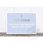 Viel Glück Spruch mit Anker und Wasser unter Kiel, positive Botschaft, dekoratives Wandbild.