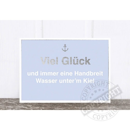 Viel Glück Spruch mit Anker und Wasser unter Kiel, positive Botschaft, dekoratives Wandbild.