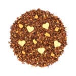 Bitterer Kräutertee mit Herz- und Sternenförmigen Schokoladenstückchen, ideal für Genuss und Entspan.