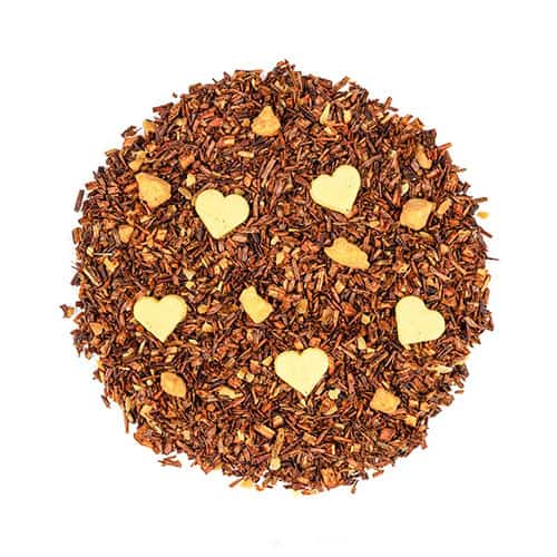 Bitterer Kräutertee mit Herz- und Sternenförmigen Schokoladenstückchen, ideal für Genuss und Entspan.