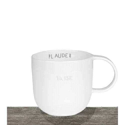 Platzhalter für eine weiße Kaffeetasse mit Markenname im Inneren, auf Holztisch.