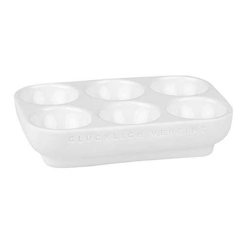 Eierbecher aus weißer Keramik, ideal für Frühstückstisch, langlebig und stilvoll.
