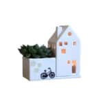 Hochwertiges Deko-Set mit Haus und Pflanze, modernes Design für stilvolle Raumgestaltung.