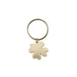 Schlüsselanhänger mit Kleeblatt Anhänger aus Gold, elegantes Accessoire für Glück und Stil.