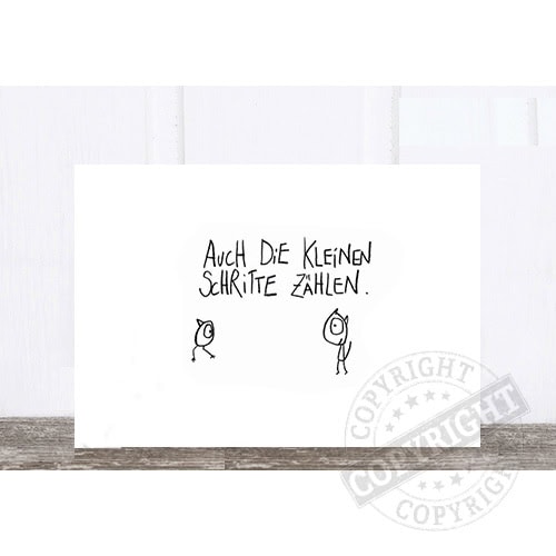 Kleines handgezeichnetes Bild mit Text "Auch die kleinen Schritte zählen" in Schwarz auf weißem Hint.