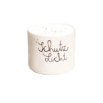 Schutzlicht Kerze mit handgeschriebener Aufschrift "Schutz Licht".