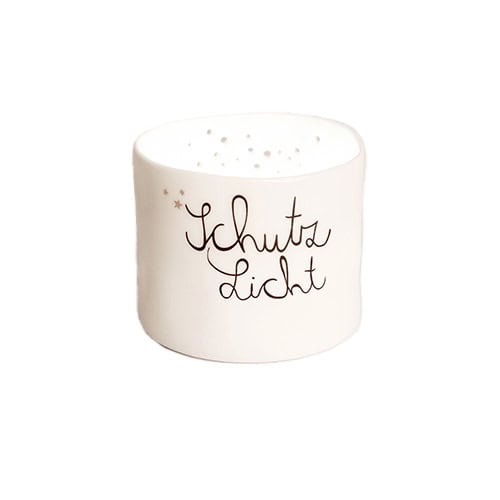 Schutzlicht Kerze mit handgeschriebener Aufschrift "Schutz Licht".