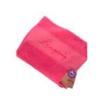 Langeoog Handtuch in Pink mit Logo, ideal für Strand und Sauna.