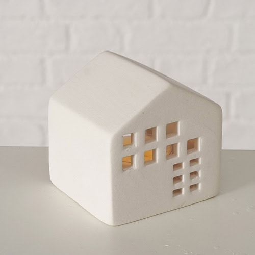 Ein modernes, minimalistisches Keramik-Haus mit Fensteröffnungen, ideal als Dekoration oder Wohnacce.