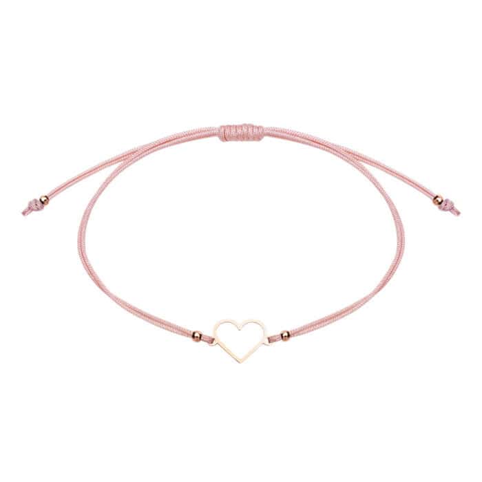 Schlichtes Herzarmband aus roséfarbenem Material mit goldfarbenem Herzanhänger, elegantes Schmuckstü.