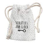 Glücksbringersäckchen mit Porzellanobjekt, Porzellan innen drin