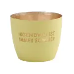 Blumentopf mit goldener Innenseite und Spruch in Deutsch.